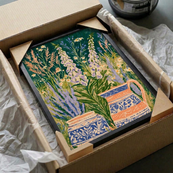 Botanical watercolor print with foxglove and daisy flowers nestled in vintage-style vases, evoking a peaceful, whimsical garden scene in lavender, coral orange, and deep green.