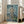Le Grand Baigneur poster featuring a solitary figure in earthy tones and soft watercolor palette, hung as framed interior wall decor.