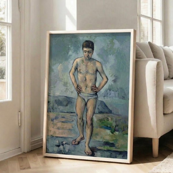 Le Grand Baigneur poster featuring a solitary figure in earthy tones and soft watercolor palette, hung as framed interior wall decor.