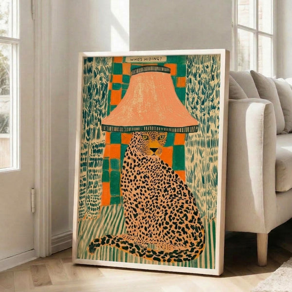 Quirky wall art print with a whimsical leopard character partially hidden behind a retro lamp, wearing an orange hat, in bold pop art and folk art style with teal green and cream colors.