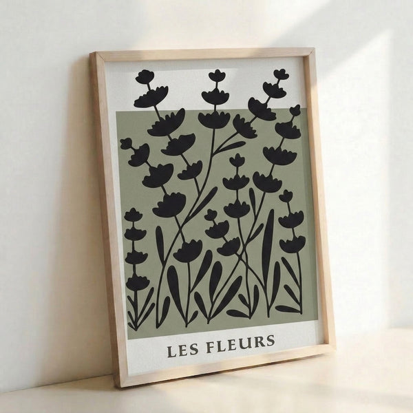 Zen garden inspired wall art with delicate plant stems and leaves in muted sage and black tones, minimalist japandi design.