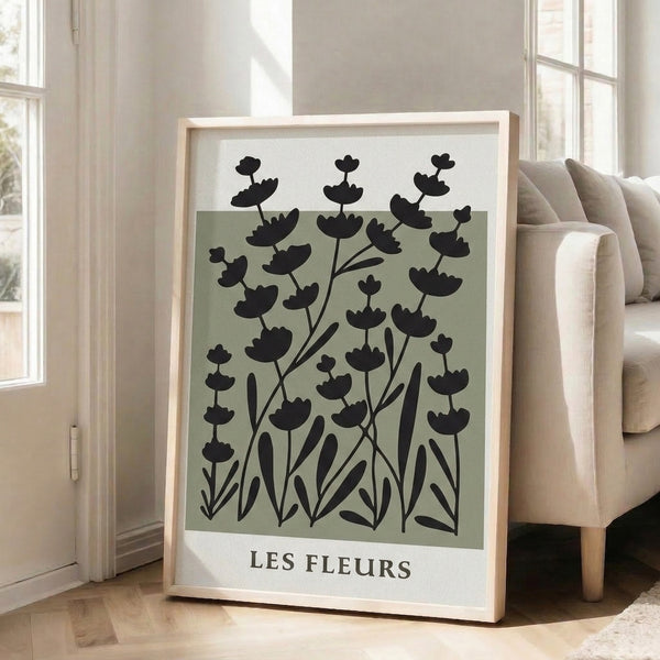 Serene botanical wall art with simplified plant forms in soft sage and black, japandi-inspired contemporary home decor.