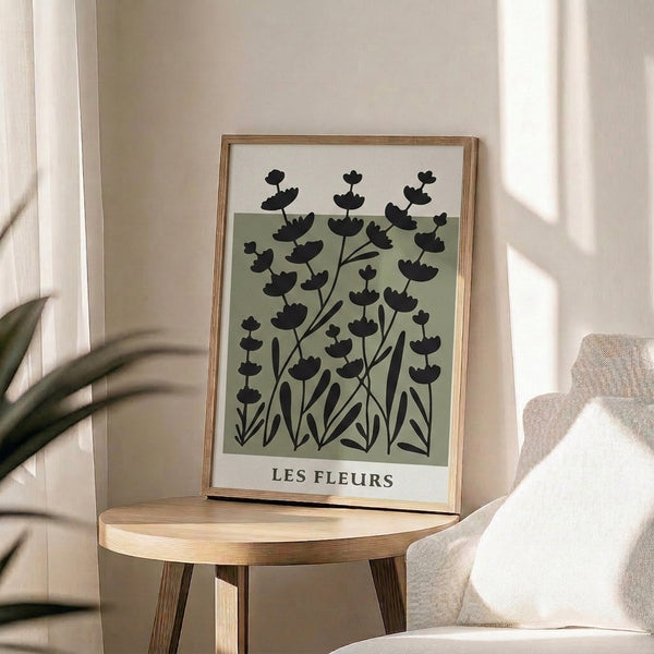 Framed botanical illustration with peaceful leaf and stem motifs in muted sage tones, modern minimalist zen garden aesthetic.