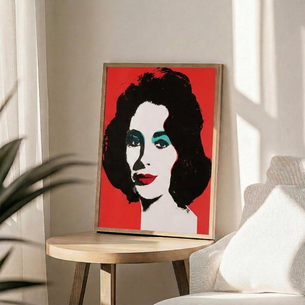 Framed artwork featuring a radiant portrait in saturated colors with layered printing effects evoking classic American pop art.