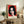 Pop art wall print featuring a stylized portrait in vivid magenta, electric blue, and yellow tones with dramatic black line work and minimalist composition.