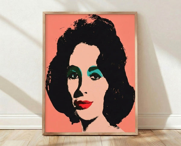 Pop art portrait of Elizabeth Taylor in vibrant colors with bold graphic style, featuring her iconic face in bright pink, blue, and yellow tones against a contrasting background.