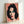 Colorful pop art representation of Elizabeth Taylor's face rendered in vivid hues of magenta, cyan, and chartreuse with bold black outlines and repeated compositional style.