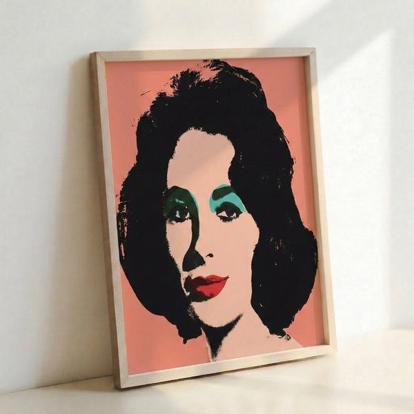 Colorful pop art representation of Elizabeth Taylor's face rendered in vivid hues of magenta, cyan, and chartreuse with bold black outlines and repeated compositional style.