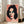 Elizabeth Taylor pop art portrait featuring flat color fields and graphic printing techniques in electric pink, turquoise, and lime green tones on a neutral wall.