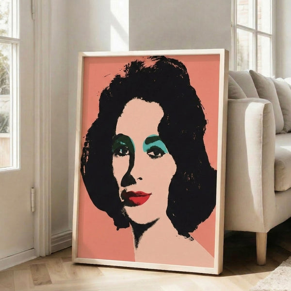Elizabeth Taylor pop art portrait featuring flat color fields and graphic printing techniques in electric pink, turquoise, and lime green tones on a neutral wall.