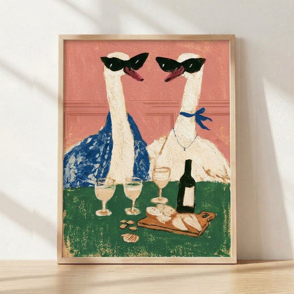 Pop art style framed poster featuring playful llamas wearing sunglasses at a wine picnic, surrounded by wine bottles, cheese, and bread in coral pink, navy blue, and cream tones.