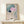 Elegant Asian art print presenting an ethereal lotus flower and bird on water, executed in gentle watercolor washes of pink, teal, and cream against a serene background.