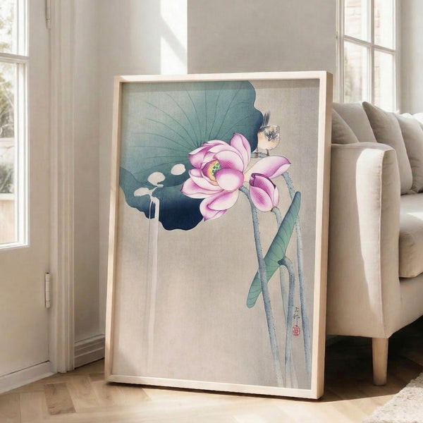 Tranquil framed poster in Japanese woodblock style showing a songbird resting near a blooming lotus, painted in soothing sage green, cream, and pink tones.