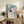 Contemplative watercolor wall art capturing a lotus and bird composition with soft cream, teal, and pink pigmentation, inspired by traditional Japanese painting aesthetics.