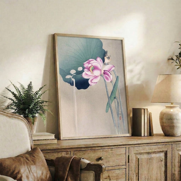 Contemplative watercolor wall art capturing a lotus and bird composition with soft cream, teal, and pink pigmentation, inspired by traditional Japanese painting aesthetics.