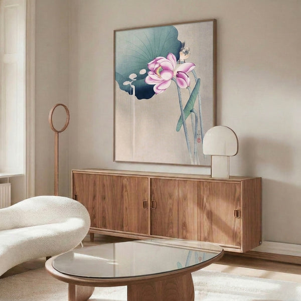 Serene framed ink wash artwork featuring a delicate lotus bloom and songbird rendered in muted sage green, teal, and pink, evoking peaceful Asian artistic traditions.