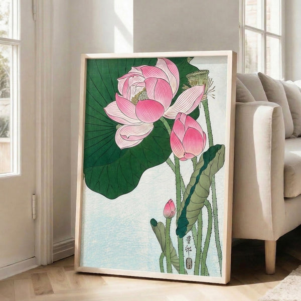 Japanese woodblock-inspired line art print of a serene lotus with pink petals, sage and dark green leaves, and gold highlights on an off-white ground.