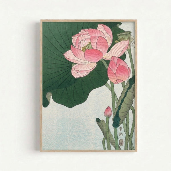 Elegant vintage-style botanical illustration featuring a delicate lotus flower in muted pink with golden yellow accents and lush green foliage, displayed as a framed art print.