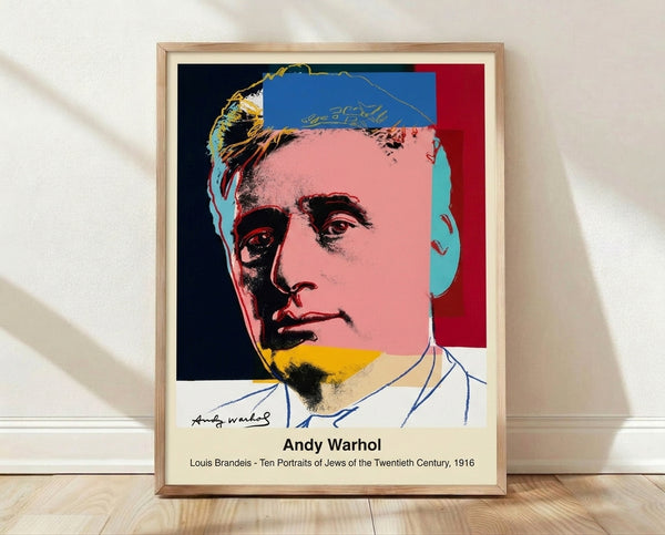 Pop art portrait of Louis Brandeis in Warhol style, featuring bold black lines and vibrant red and cream tones on a grey background, framed on a wall.