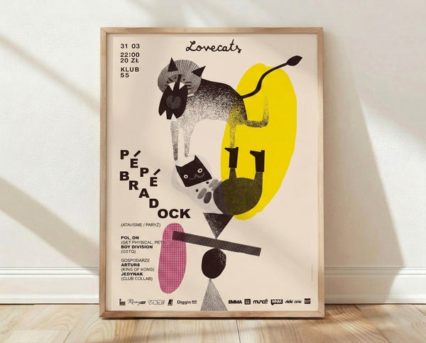 Framed Bauhaus-style poster featuring an abstract black cat face with geometric shapes in cream, yellow, and pink tones on a neutral background.