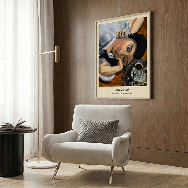 Matisse-style framed print of a woman in an intimate moment with her coffee, rendered in warm ochre and cool blue with pops of red and green.