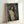 Wall art depicting a spiritual portrait of a figure surrounded by an ethereal halo, executed in expressionist style with a moody palette of browns, golds, and deep shadows.