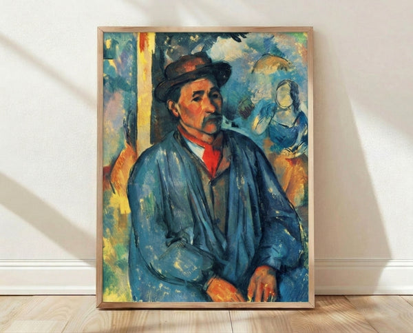 Framed portrait painting of a man wearing a blue smock, rendered in muted earth tones and soft brushwork characteristic of Post-Impressionist art.