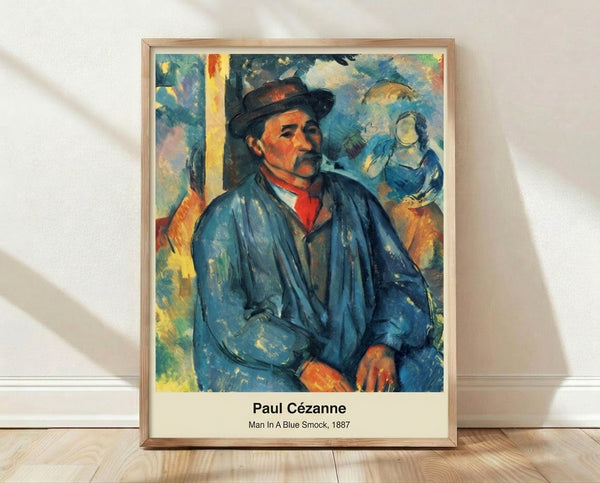Impressionist portrait of a man wearing a blue smock, rendered in muted earth tones and grey, hanging as a framed art print on a wall.
