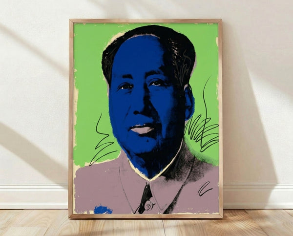 Pop art portrait of Mao in vibrant colors with bold graphic treatment, framed poster on wall in modern interior