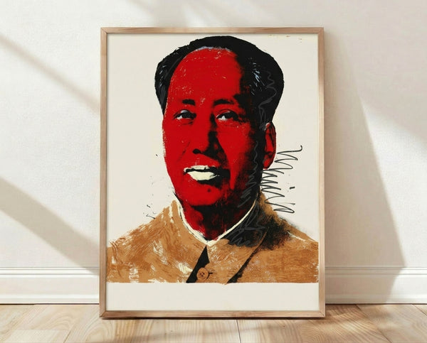 Pop art portrait of Mao in vibrant colors with bold graphic style, framed poster on wall.
