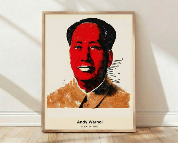 Bold pop art portrait of Mao Tse Tung in vibrant magenta, pink, and cyan with stark black outlines, rendered in the iconic Warhol style on a framed poster.