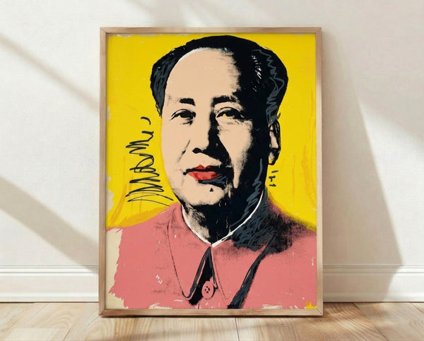 Pop art portrait of Mao in bold red, yellow, and orange tones with high-contrast graphic style characteristic of 1960s Warhol prints.