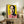Warhol-inspired portrait print of Mao with bold brushwork and experimental color palette in warm, eye-catching tones.