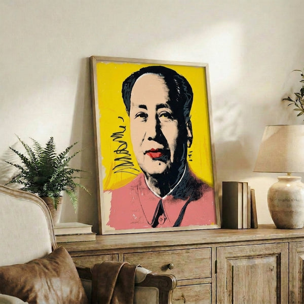 Warhol-inspired portrait print of Mao with bold brushwork and experimental color palette in warm, eye-catching tones.