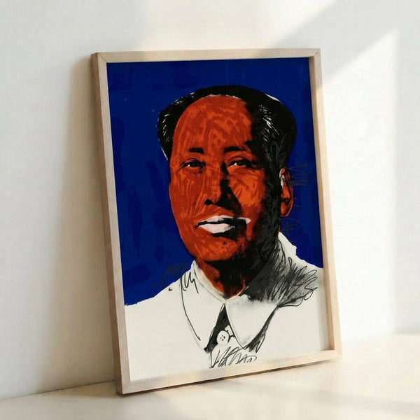 Contemporary pop art wall decor with Mao portrait rendered in saturated color fields and bold outlines, creating high-impact visual statement.