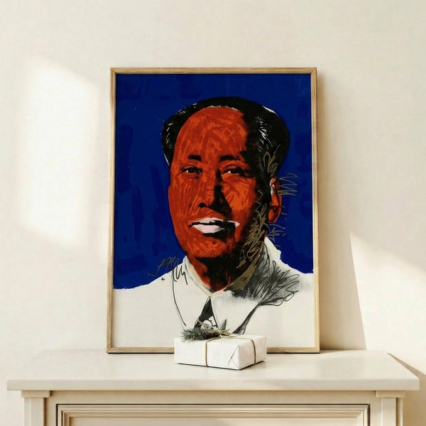Framed modern art print displaying Mao in vibrant pop art palette with layered color intensity and graphic simplification of features.