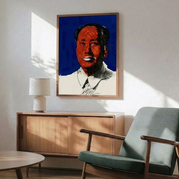 Warhol-inspired framed poster featuring Mao's visage in vivid complementary colors with stark graphic treatment and repetition-based design.