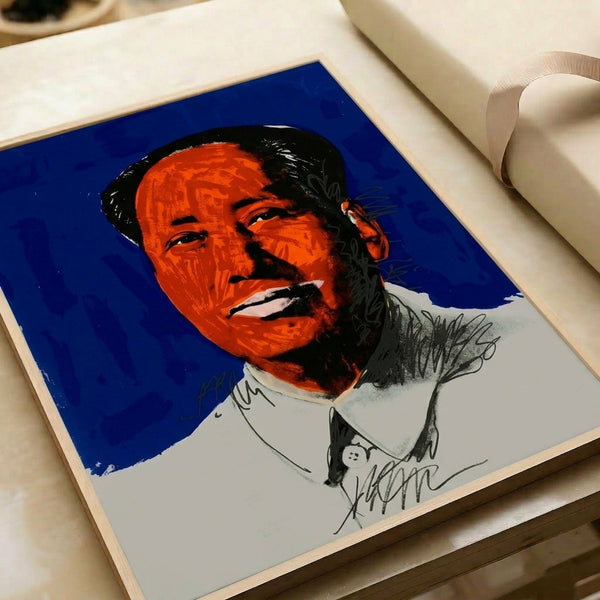 Striking pop art wall print of Mao's face rendered in bold, contrasting hues and simplified forms typical of iconic silkscreen art prints.
