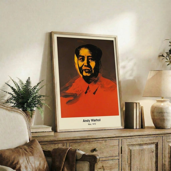 Pop art poster featuring a simplified, colorful portrait face in red, yellow, and green against black, contemporary framed print.