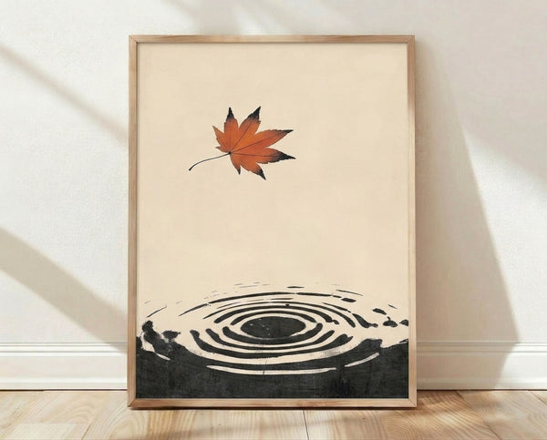 Minimalist Japanese woodblock-style poster featuring a rust-orange maple leaf centered within a black enso circle, surrounded by rippling water lines on cream background, evoking zen meditation and autumn tranquility.