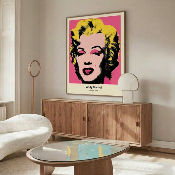 Modern pop art wall art showing a stylized woman's portrait in electric pink and gold against black and white elements, exuding iconic intensity.