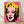 Bold pop art portrait featuring a stylized face in vibrant pink, yellow, and blue tones on a contrasting background, framed and hung on a wall.