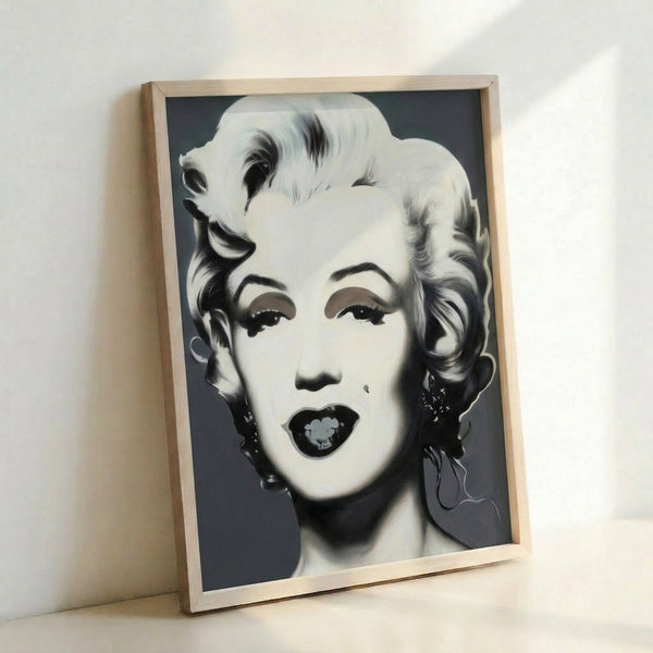 Striking monochromatic Marilyn Monroe portrait in pop art style with stark contrasts and minimalist line work, shown framed as modern wall art.