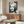 Monochromatic Marilyn Monroe portrait art print with pop art sensibility, featuring stark tonal contrast and minimalist illustrative approach on a wall.