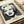 Pop art style monochrome portrait with stark black, white, and gray palette creating a bold, iconic image; modern framed print art.