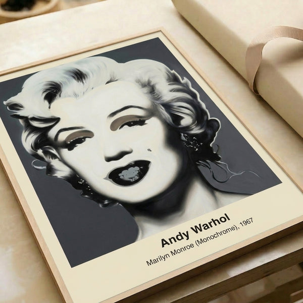 Pop art style monochrome portrait with stark black, white, and gray palette creating a bold, iconic image; modern framed print art.
