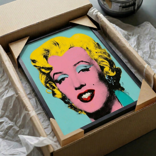 Framed pop art print of Marilyn Monroe in cool blue tones, contemporary silkscreen-style portrait with artistic modern appeal.