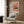 Framed abstract wall art showcasing warm terracotta and rust tones layered with cool blue, embodying a meditative color field aesthetic.