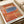 Framed minimalist poster featuring warm and cool color blocking in orange, cream, and blue tones with a serene, meditative aesthetic.