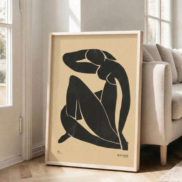 Sophisticated line drawing of a reclining figure in black on cream, capturing the graceful simplicity of modernist cutout figure study.